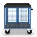 Verkstadsvagn Indra, front och långsidor av stålgaller, utan hyllplan